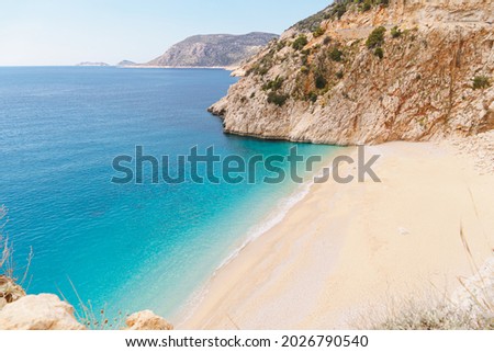 Picturesque sea bay with beautiful beach with turquoise water. Summer beach holiday background