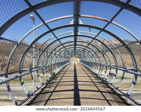 Walk into the future through steel tunnel