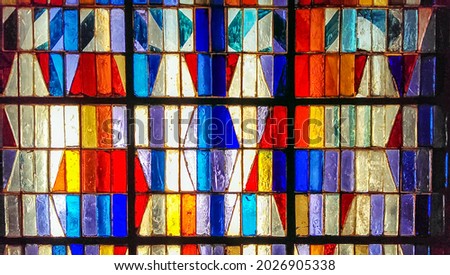 Colorful abstract stained glass background. Medieval random pieces of glass pattern with backlight Royalty-Free Stock Photo #2026905338