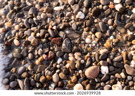 small pebble rock background texture at the beach