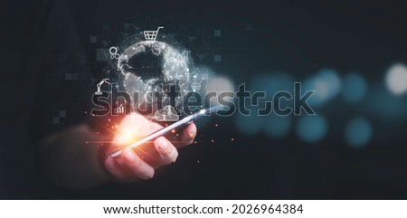 Business man using mobile phone for communication working and transaction ,Global  business by internet connection technology for financial banking , big data and digital linkage concept. Royalty-Free Stock Photo #2026964384