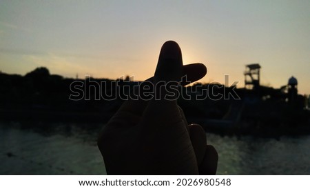 Saranghaeyo in silluet sunset background