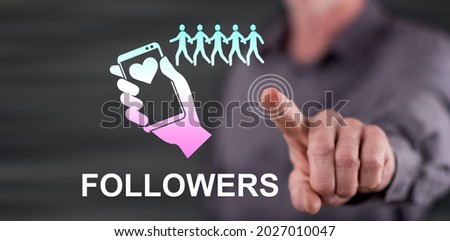 Man touching a followers concept on a touch screen with his finger