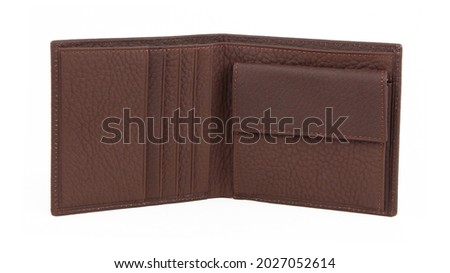 New brown open empty wallet of cattle leather. Isolated on white background. Close-up shot