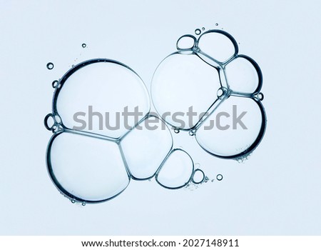 Liquid foam gel gray transparent cosmetic sample texture with bubbles Royalty-Free Stock Photo #2027148911