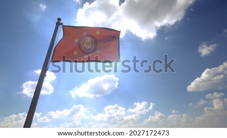 Cherokee Nation Flag on a Pole waving with Blue cloudy sky in the background Native American Flag Royalty-Free Stock Photo #2027172473