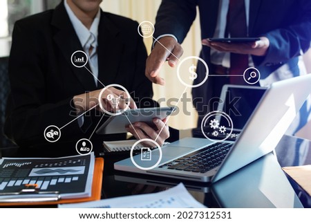 Business team present. professional investor working new start up project. tablet laptop computer with digital marketing media  in virtual icon design Finance managers meeting.