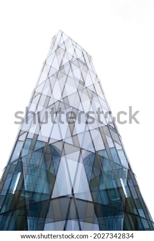 Double exposure photo of windows resembling pyramid built structure with glass walls. Abstract modern architecture in minimal style. Hi-tech building exterior. Geometric background. Polygonal pattern.