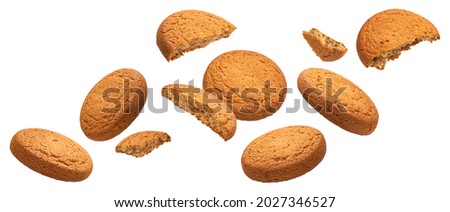 Falling oatmeal cookies isolated on white background Royalty-Free Stock Photo #2027346527