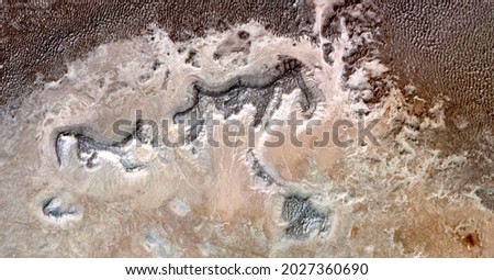 rock engravings,  abstract photography of the deserts of Africa from the air. aerial view of desert landscapes, Genre: Abstract Naturalism, from the abstract to the figurative, 