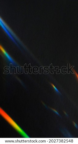 Light leak effect on a black mobile screen background