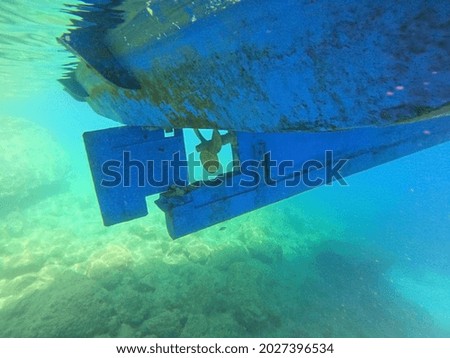 Underwater view to yacht rudder and prop, scuba diving concept. Aegean Sea. Near Marmaris, Turkey