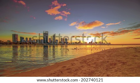 Western Australia - Golden Sunrise View of Perth Skyline from Swan River Royalty-Free Stock Photo #202740121