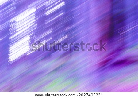 Fast forward. Colourful, bright and vibrant nature abstract photo created using ICM image technique. Ideal for wall art print, background or wallpaper. Royalty-Free Stock Photo #2027405231