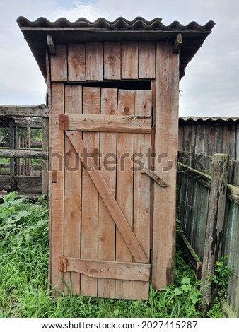 In many villages, the toilet is located outside. They often build a toilet with a wooden one, and paint it for beauty.