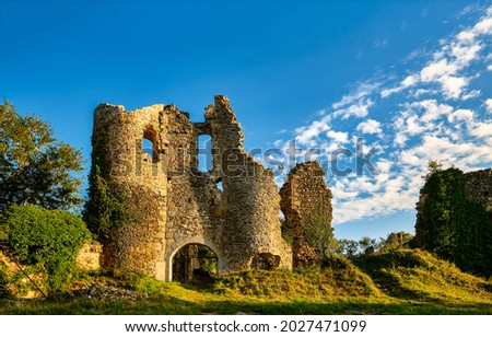 Ruin of a medieval castle. Ruined tower of medieval fortress Royalty-Free Stock Photo #2027471099