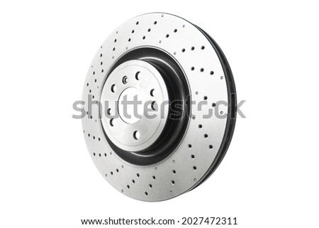 Car brake disc isolated on white background. Auto spare parts. Perforated brake disc rotor isolated on white. Braking ventilated discs. Quality spare parts for car service or maintenance Royalty-Free Stock Photo #2027472311