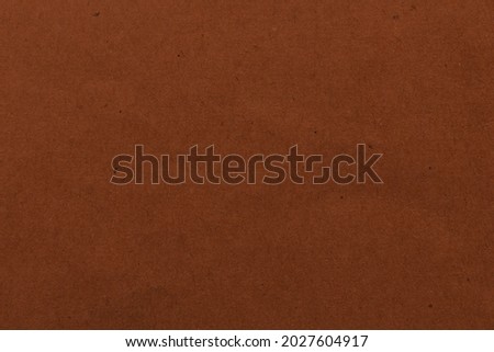 Brown craft cardboard background texture.
