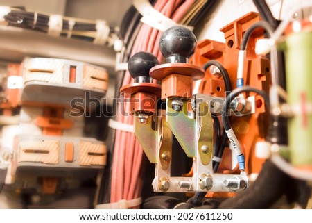 Electric knife switch. Retro knife switch. Voltage switchboard with circuit breakers. Electrical background.