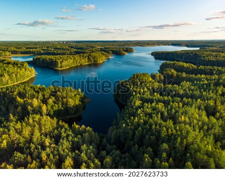 Beautiful aerial view of Moletai region, famous or its lakes. Scenic summer evening landscape, Moletai, Lithuania Royalty-Free Stock Photo #2027623733