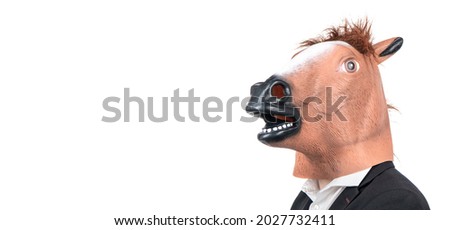 Professional hardworking man employee wear weird horse head isolated on white, workaholic Royalty-Free Stock Photo #2027732411
