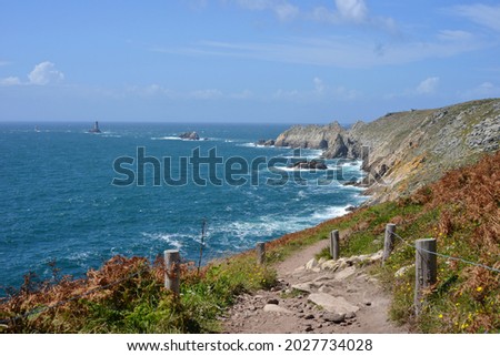 Hiking trail on the brittany coast view to Pointe du Raz, France Royalty-Free Stock Photo #2027734028