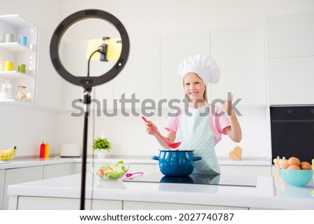 Photo of young girl happy positive smile show thumb-up fine recommend ad shooting video vlogger culinary home