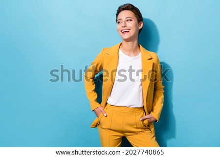 Photo portrait business woman wearing yellow blazer laughing looking copyspace isolated pastel blue color background Royalty-Free Stock Photo #2027740865