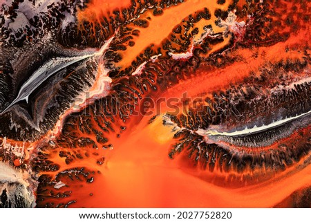 Fluid art texture. Background with abstract paint effect. Liquid picture with dinamic lines and fractals. Mixed paints for wall art or design poster. Backdrop similar to the landscape of movement lava