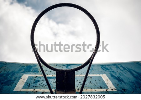 Directly Below Shot Of Basketball Hoop Against Sky. 
