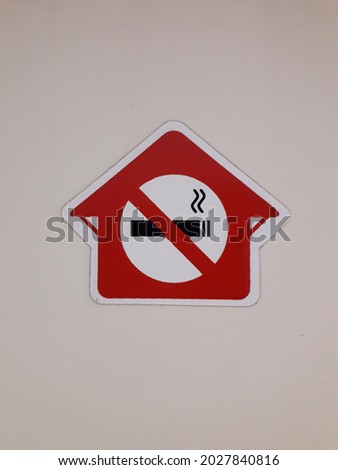 no smoking warning sign on wall
