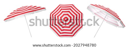 Set with striped beach umbrellas on white background. Banner design Royalty-Free Stock Photo #2027948780