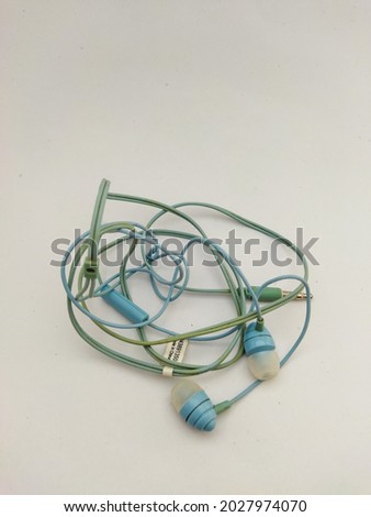 Blue used headset isolated on white background