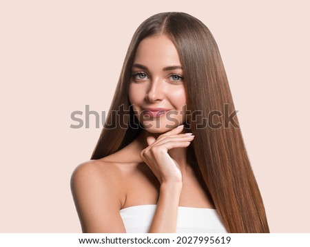 Beautiful long smooth hair woman happy clean skin face color background Royalty-Free Stock Photo #2027995619