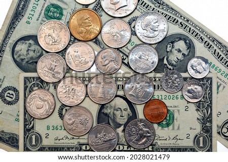 Background of old American dollars banknotes and coins of different values, vintage retro, United States of America currency