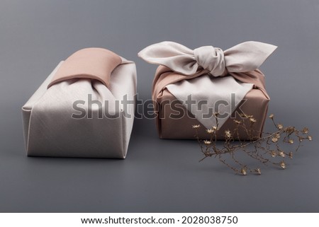 Korean traditional wrapping cloth packaging. furoshiki packaging gift box Royalty-Free Stock Photo #2028038750