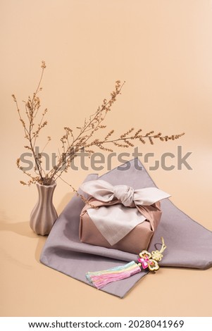 Korean traditional wrapping cloth packaging. furoshiki packaging gift box Royalty-Free Stock Photo #2028041969