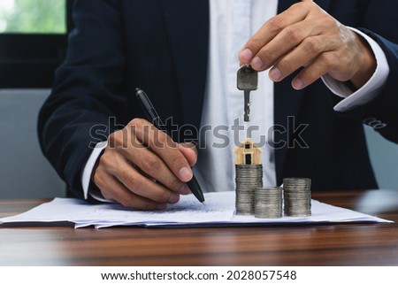 Man signs contract to buying home