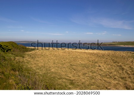 The rural landscape of the Orkney Islands in Scotland, UK