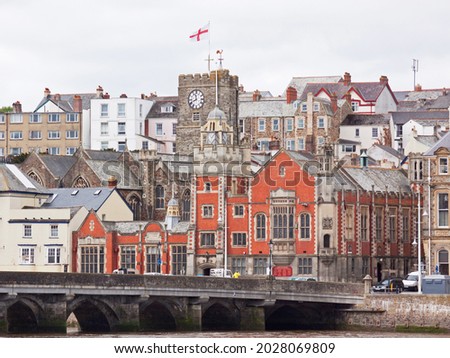 Entrance to the old town of Bideford in North Devon UK showing the Parish Church and Town Hall at the end of the landmark medieval bridge  Royalty-Free Stock Photo #2028069809