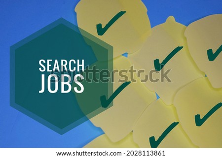 A sticky notes with a right symbol on it and a phrase SEARCH JOBS.
