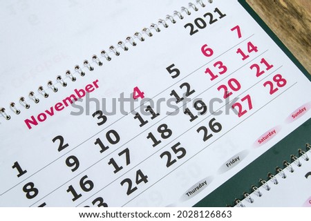 November 2021 on the calendar page, wall calendar, business planning concept. Royalty-Free Stock Photo #2028126863