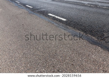 painted with white paint automobile road markings, paved road with white road markings for transport management