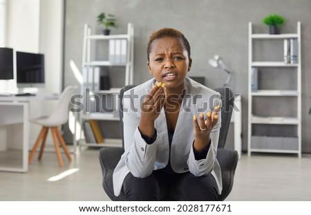 I don't understand what you are talking about. Puzzled woman having conversation, gesticulating with grimace of confusion, frowning, trying to get complicated explanation, struggling to find solution Royalty-Free Stock Photo #2028177671