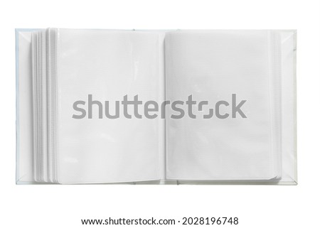 Empty photo album spread isolated on white background
