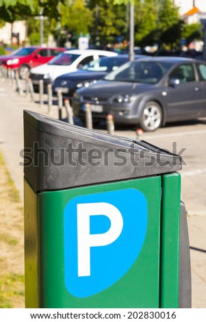 Automatic charge a fee for parking, paid parking for cars. Parking fees.