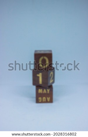 blur photo of brown calendar wooden block arrangement