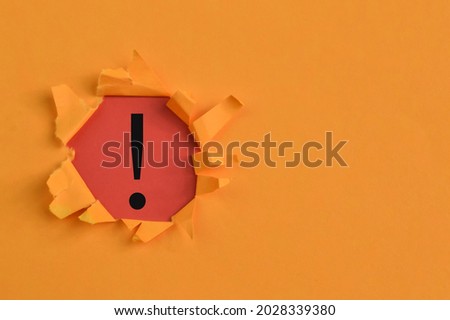 Exclamation mark drawn on red background with copy space