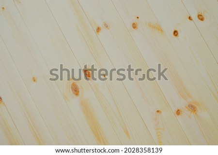 Natural pine wood striped is a wooden beautiful pattern for background