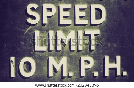 Vintage retro looking A traffic sign speed limit 10 mph